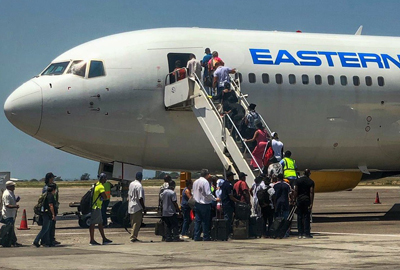 An Eastern Airlines repatriation flight boarding Americans stranded by the COVID-19 pandemic in Haiti.