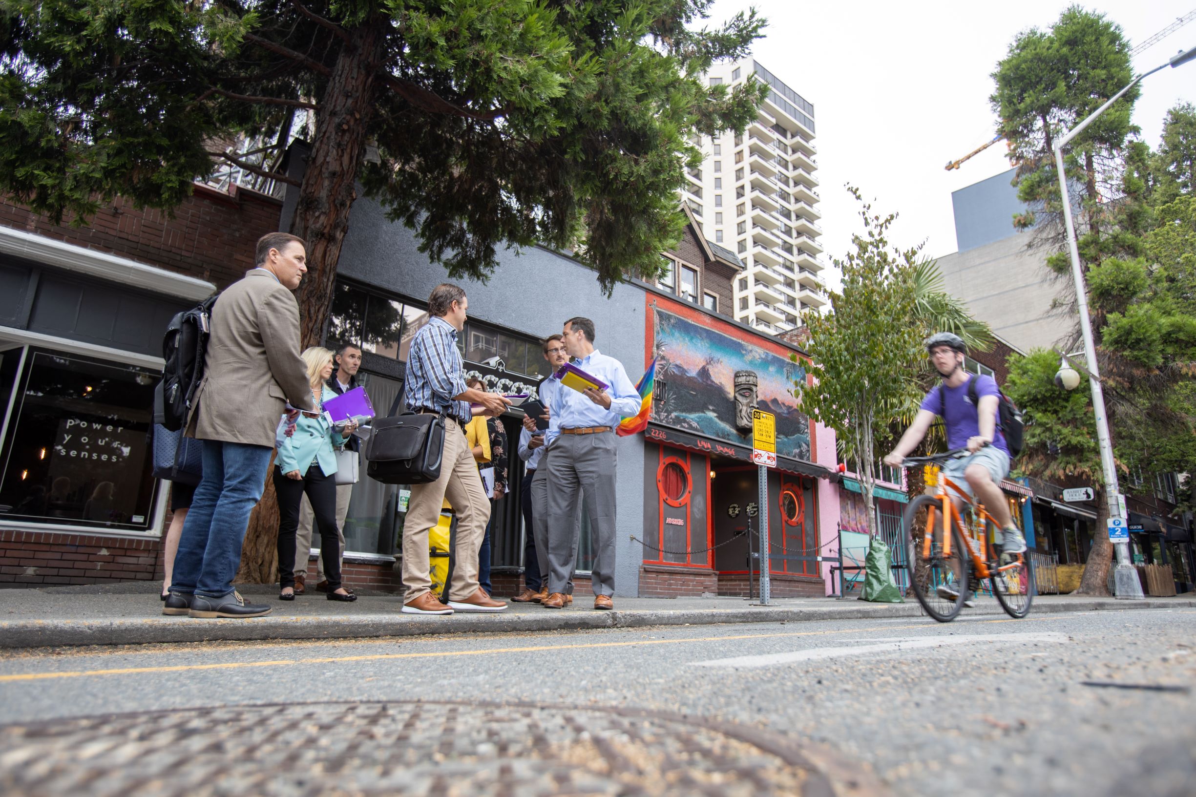 Researchers touring Seattle Belltown neighborhood streets.