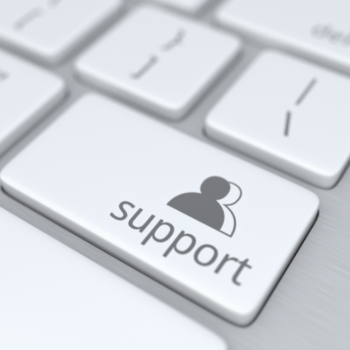 Button on a keyboard that has people icons and text that says "support."