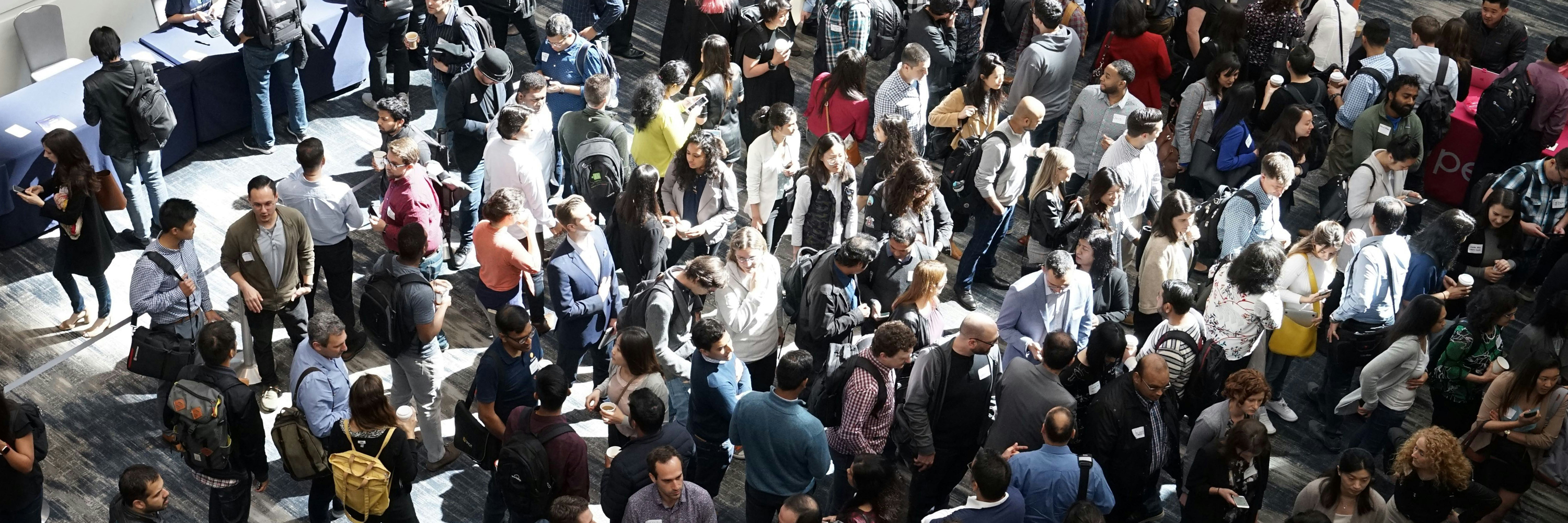 Crowd of people at a conference.