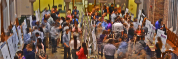 People and posters at a conference