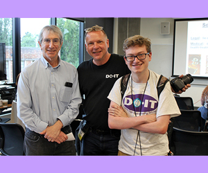 Eric Chudler (left), Scott Bellman (center) and a UW student (right) pose for a photograph.