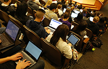 students with laptops in a lecture class at University of Washington in 2014. Photo: Ken Lambert / The Seattle Times